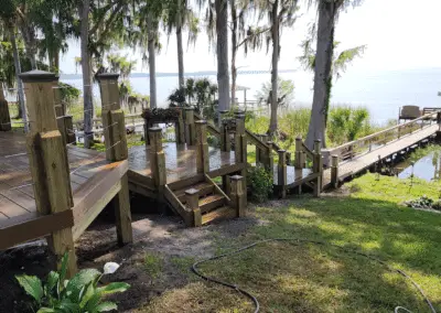 Wooden decks, steps and walkway leading to a lake